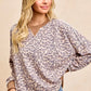 BiBi Leopard Printed French Terry Sweatshirt in beige and gray