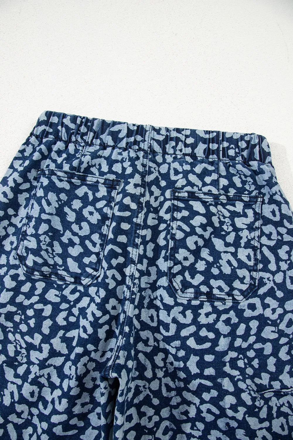 Navy blue and white leopard print wide leg jeans with elastic waistband