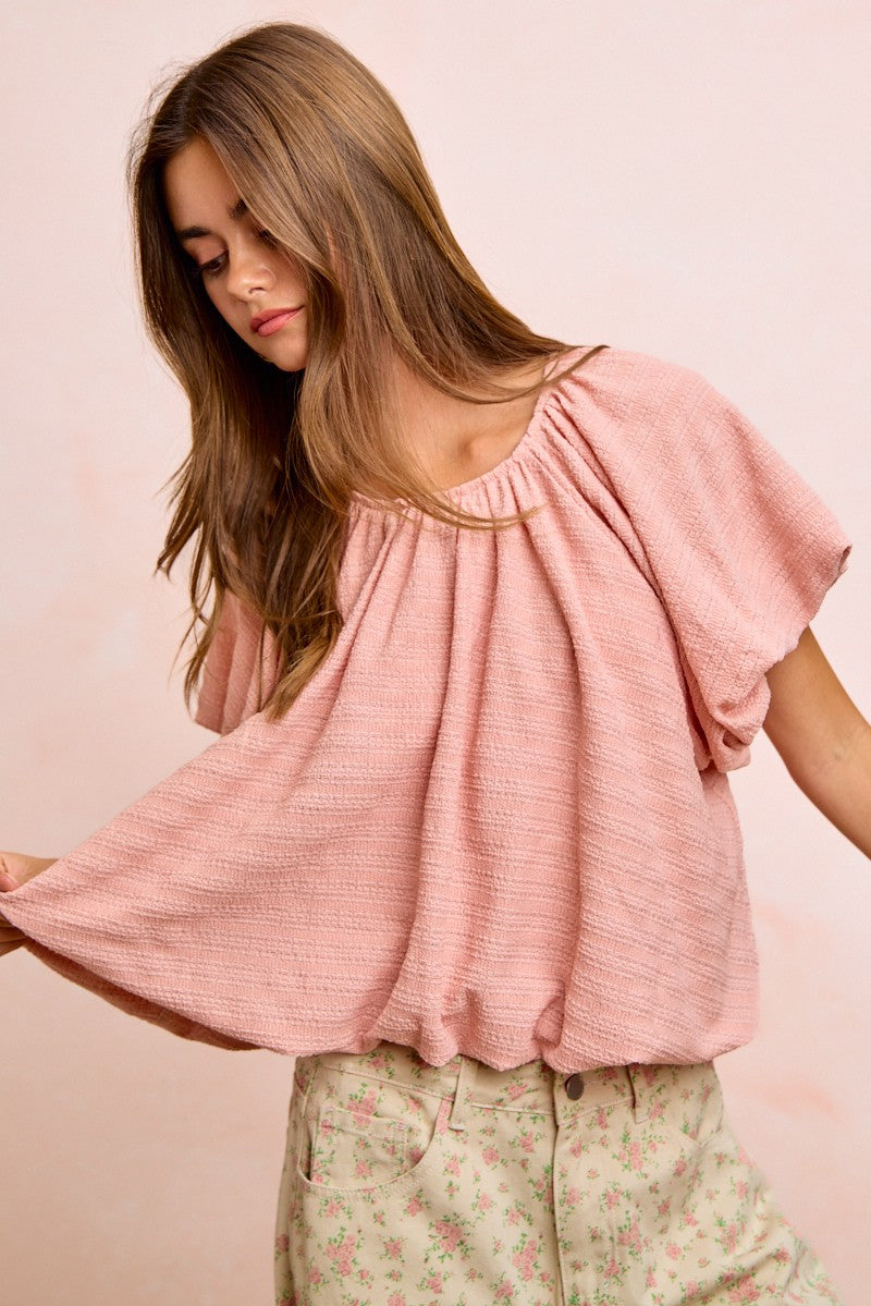 BiBi Stripes soft pink textured cotton blouse with shirred neckline and flutter sleeves