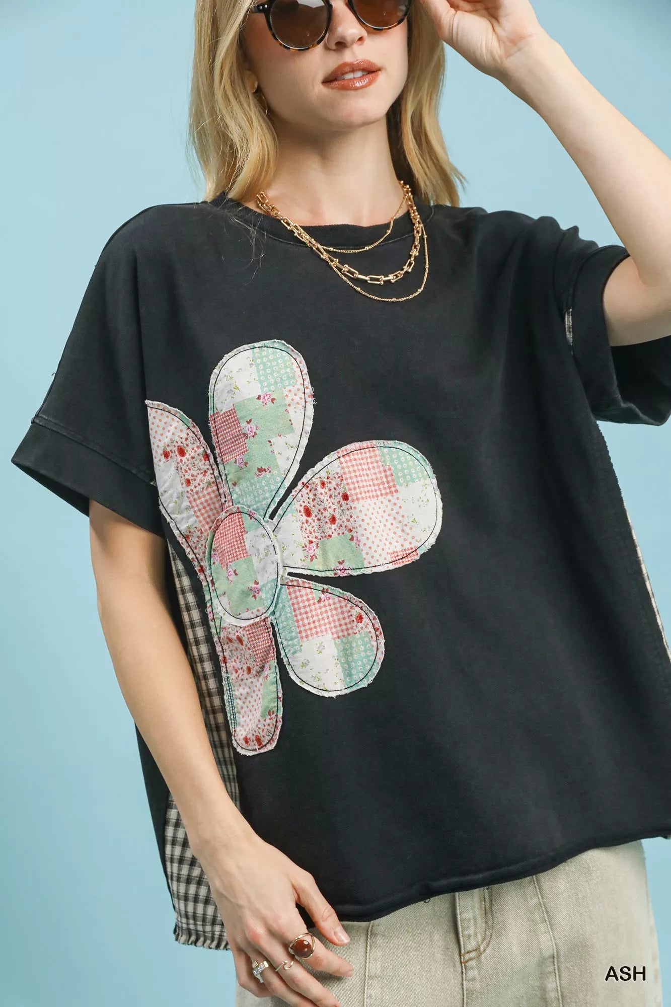Black Umgee Ash mineral wash French terry top with pastel patchwork flowers