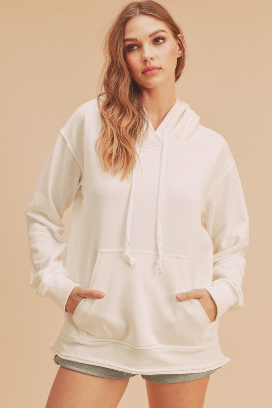 Aemi + Co Raw Hem Kangaroo Pocketed Drawstring Hoodie White Hoodies