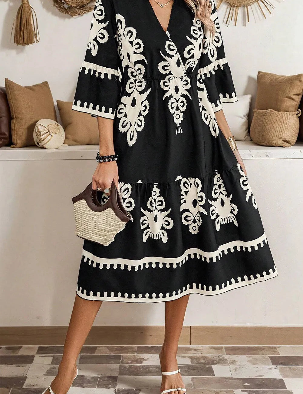 Black and white floral print V-neck dress with three-quarter sleeves