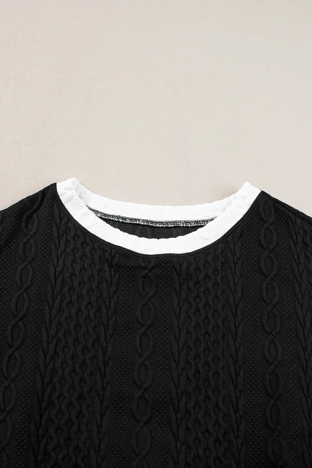 Black cable-knit sweater with white ribbed crew neck in Contrast Trim Set
