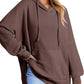 Brown waffle-knit oversized hoodie with drawstring side slit and front pocket by Daverri Fashions