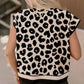 Daverri Fashions black and cream leopard cap sleeve sweater with ribbed hem