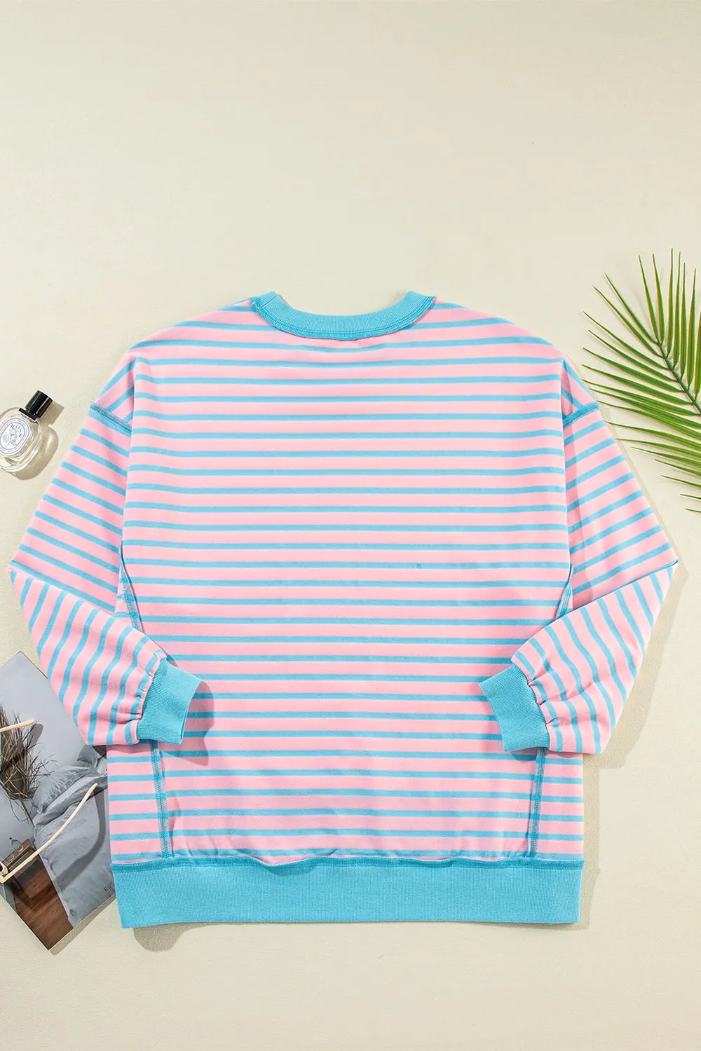 High-low striped long sleeve sweatshirt in pastel pink and light blue