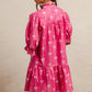 Vibrant pink BiBi ribbon patterns dress with scallops, puffed sleeves, tiered skirt