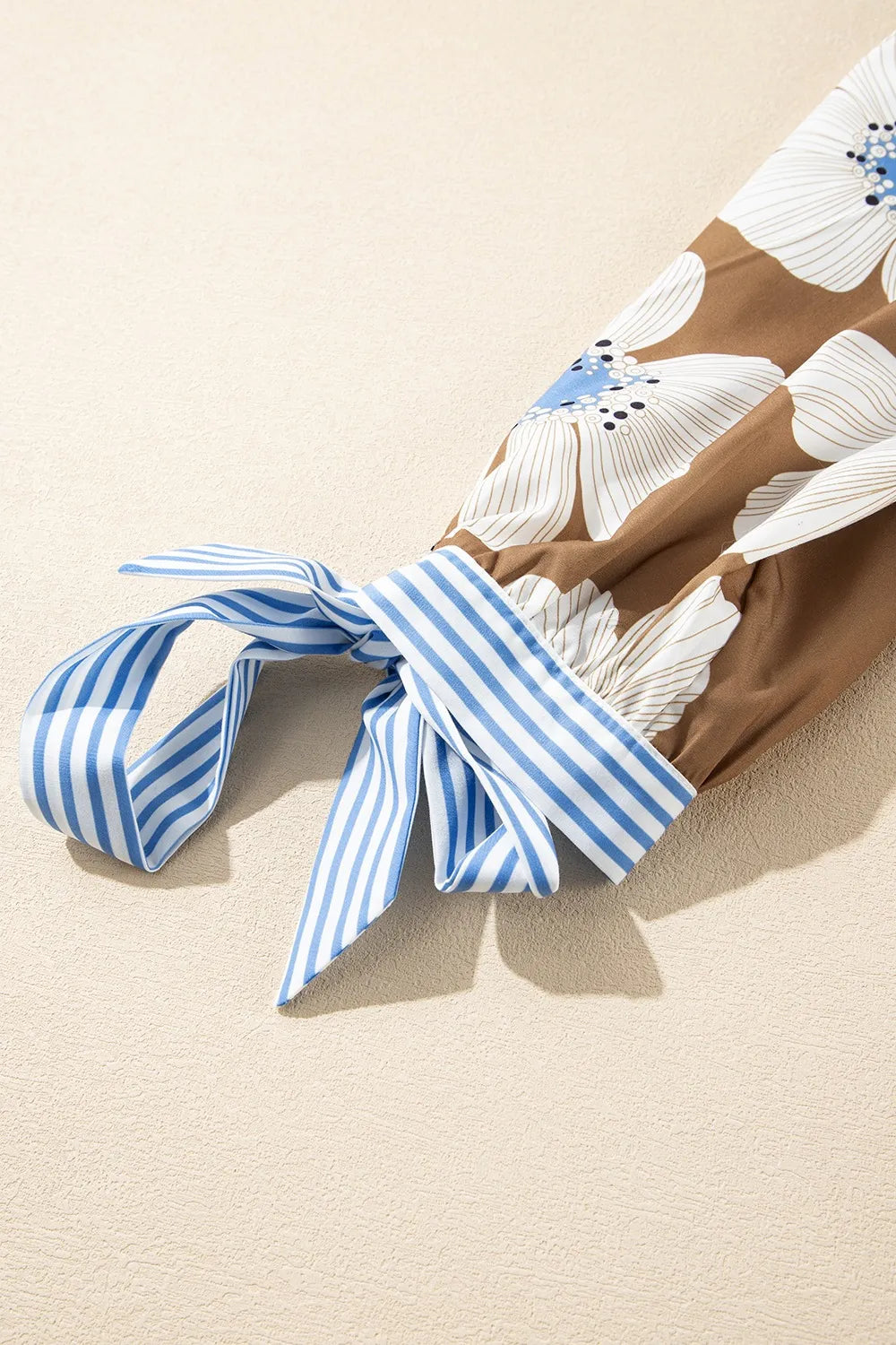 Floral print striped tie sleeve blouse in brown with white blue patterns