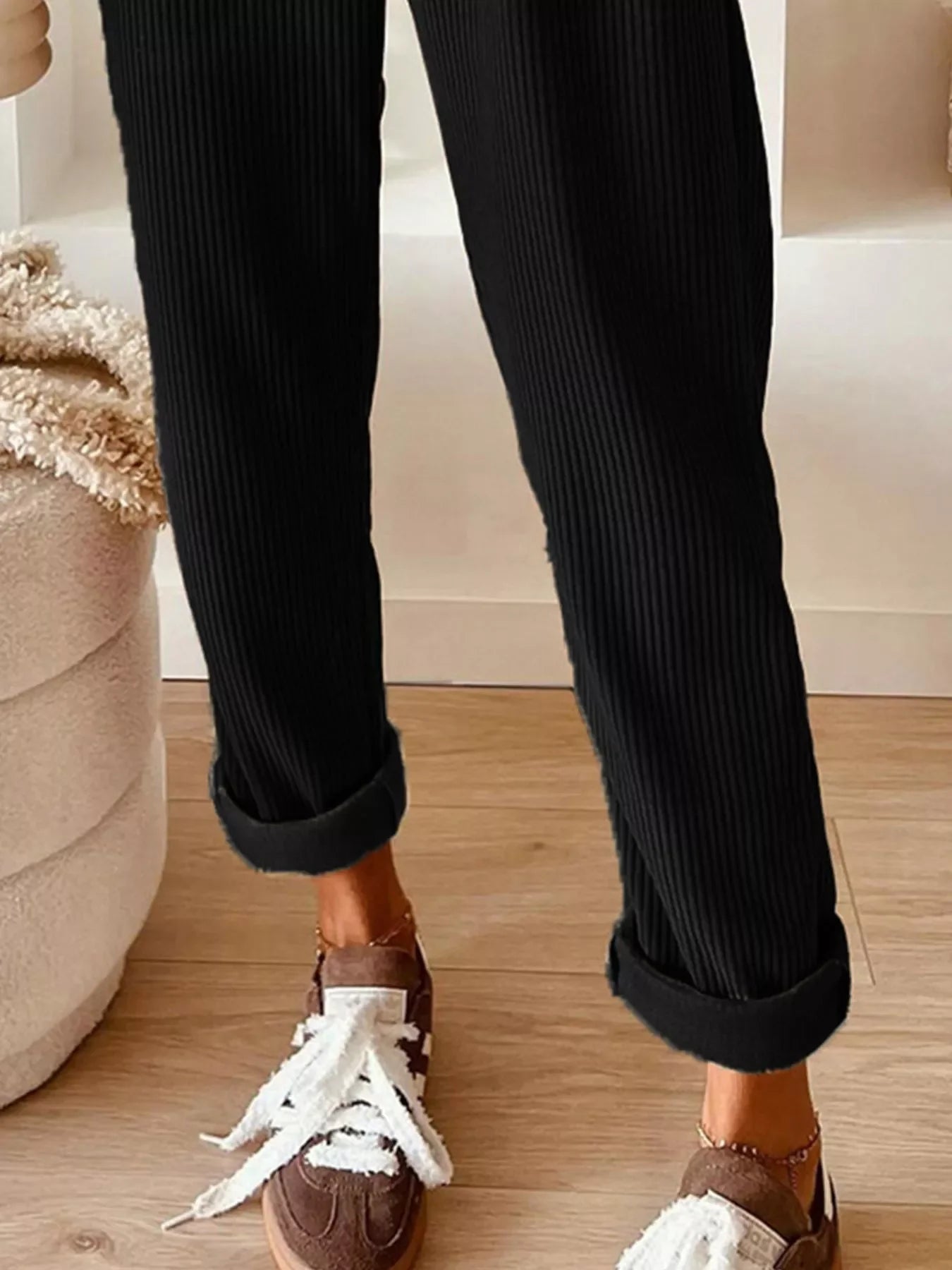Black Daverri corduroy drawstring pants with rolled cuffs