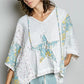 POL Floral Star Patch Hooded Blouse in white and light blue with floral patterns