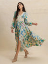 Slit printed V-neck long sleeve floral maxi dress in vibrant greens, blues, pinks on cream base with lace-trimmed bodice