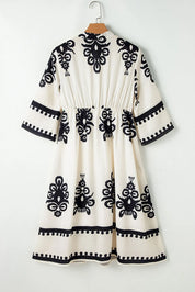 White and black embroidered printed dress with bell sleeves