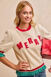 Cream Merry Christmas sweater with red green trim, puff sleeves, ruffled hem