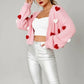 Pink knitted womens puff hearts open front cardigan with red white pom poms