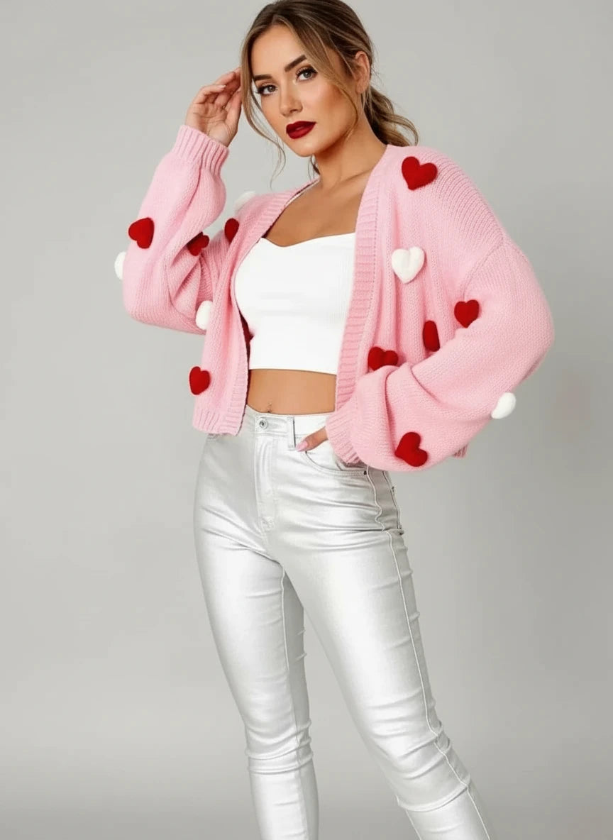 Pink knitted womens puff hearts open front cardigan with red white pom poms