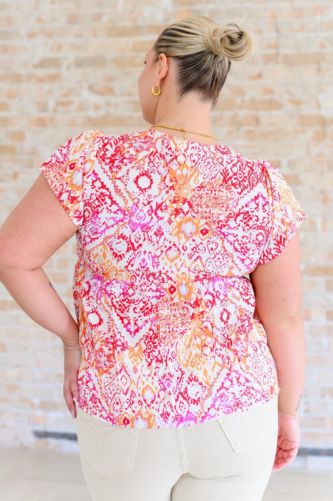 A Matter of Time Flutter Sleeve Top in Multi Tops