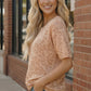 Blush safari leopard-print knit top in soft peach, relaxed fit