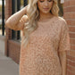 Soft blush safari knit top with subtle leopard print and short sleeves