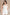 Anna High Rise Garment Dyed Cutoff Shortalls in Ecru Shortalls