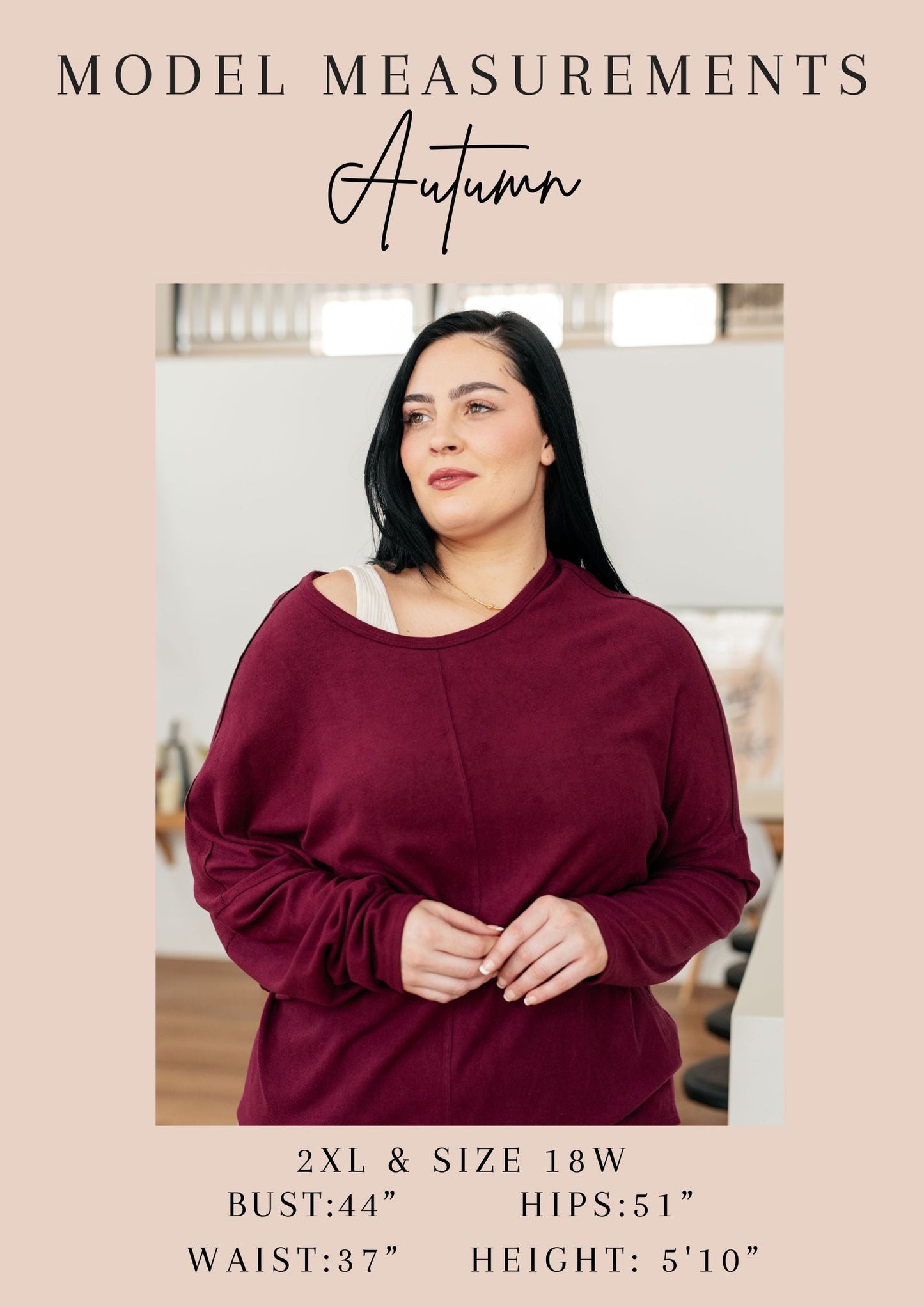 Plus-size model in Doesn’t Compare V-Neck maroon off-shoulder top