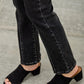 Black suede mule heels with low block heel, open toe, styled with Saige Denim jeans