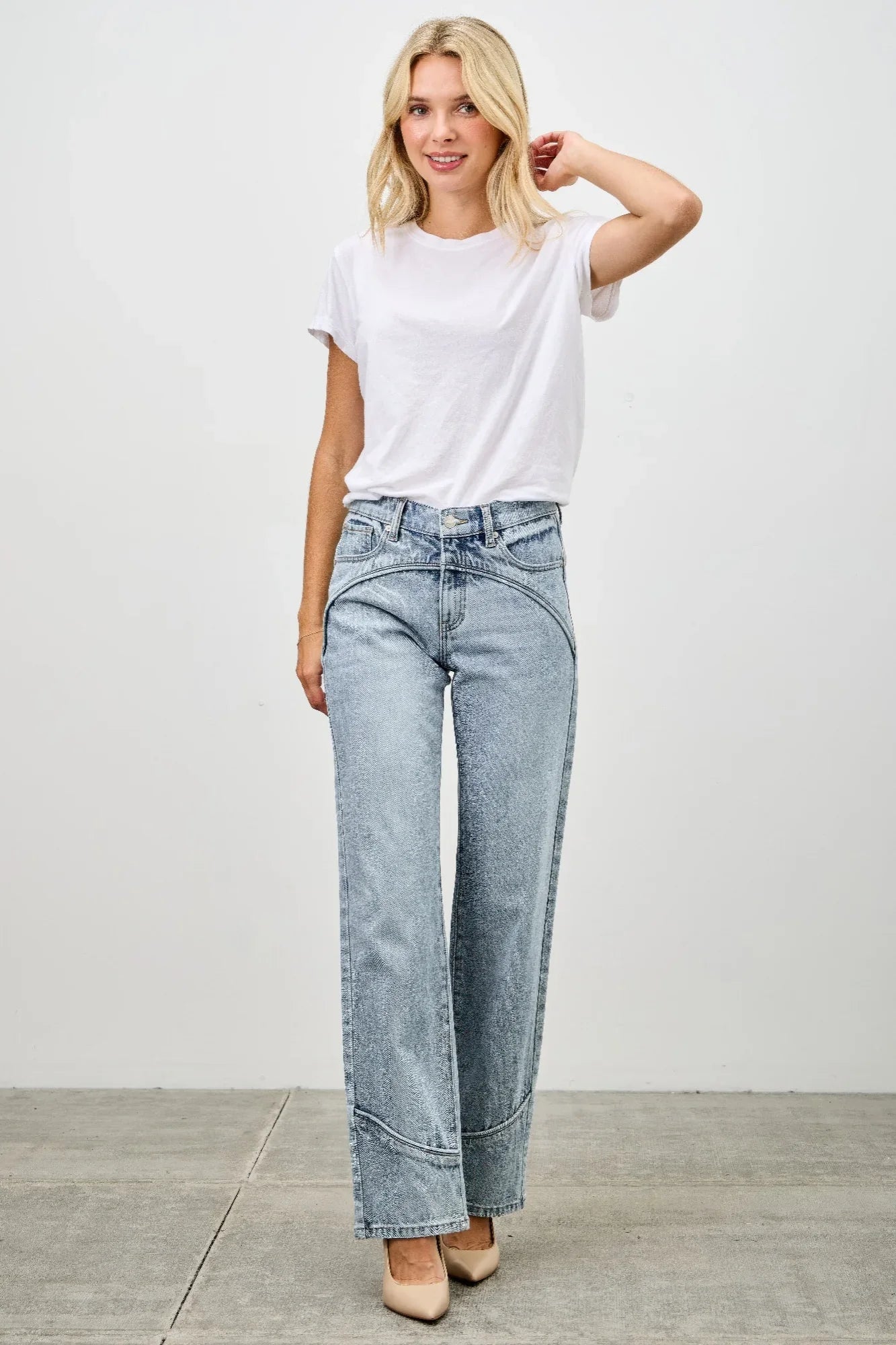 Light-wash high-rise wide-leg denim jeans with rolled cuffs