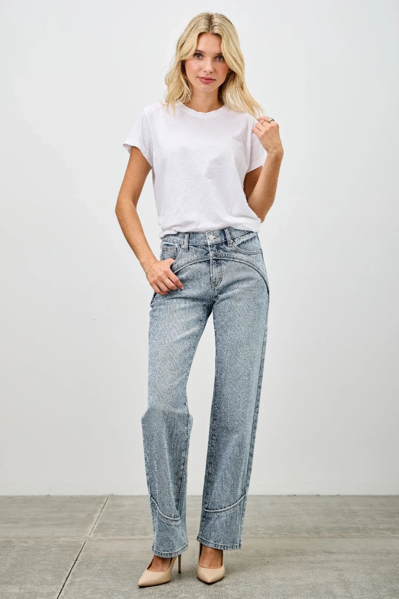 Light-wash Saige denim straight-leg jeans with piping detail and rolled cuffs