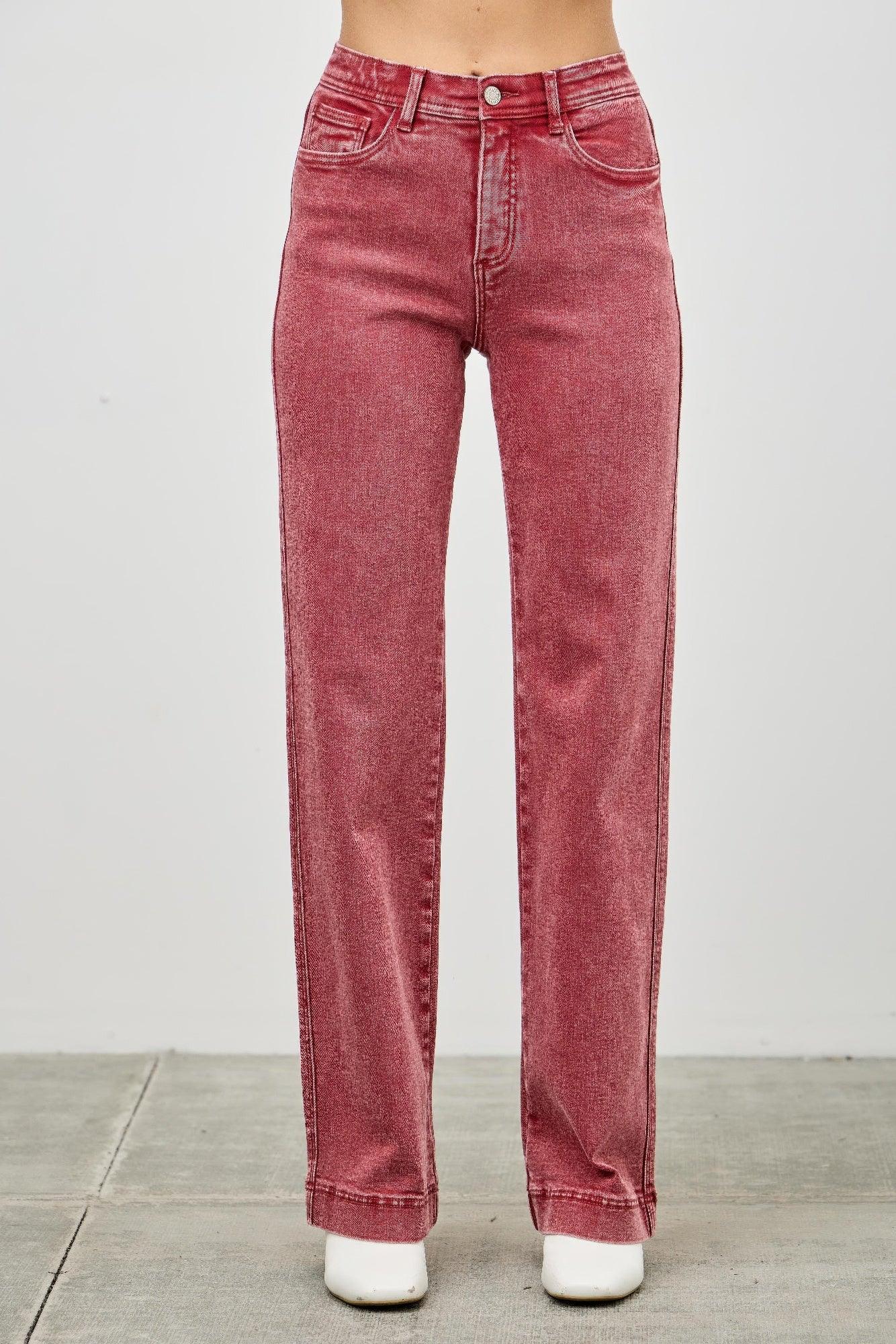 High-rise red denim jeans with straight-leg cut and rolled cuffs