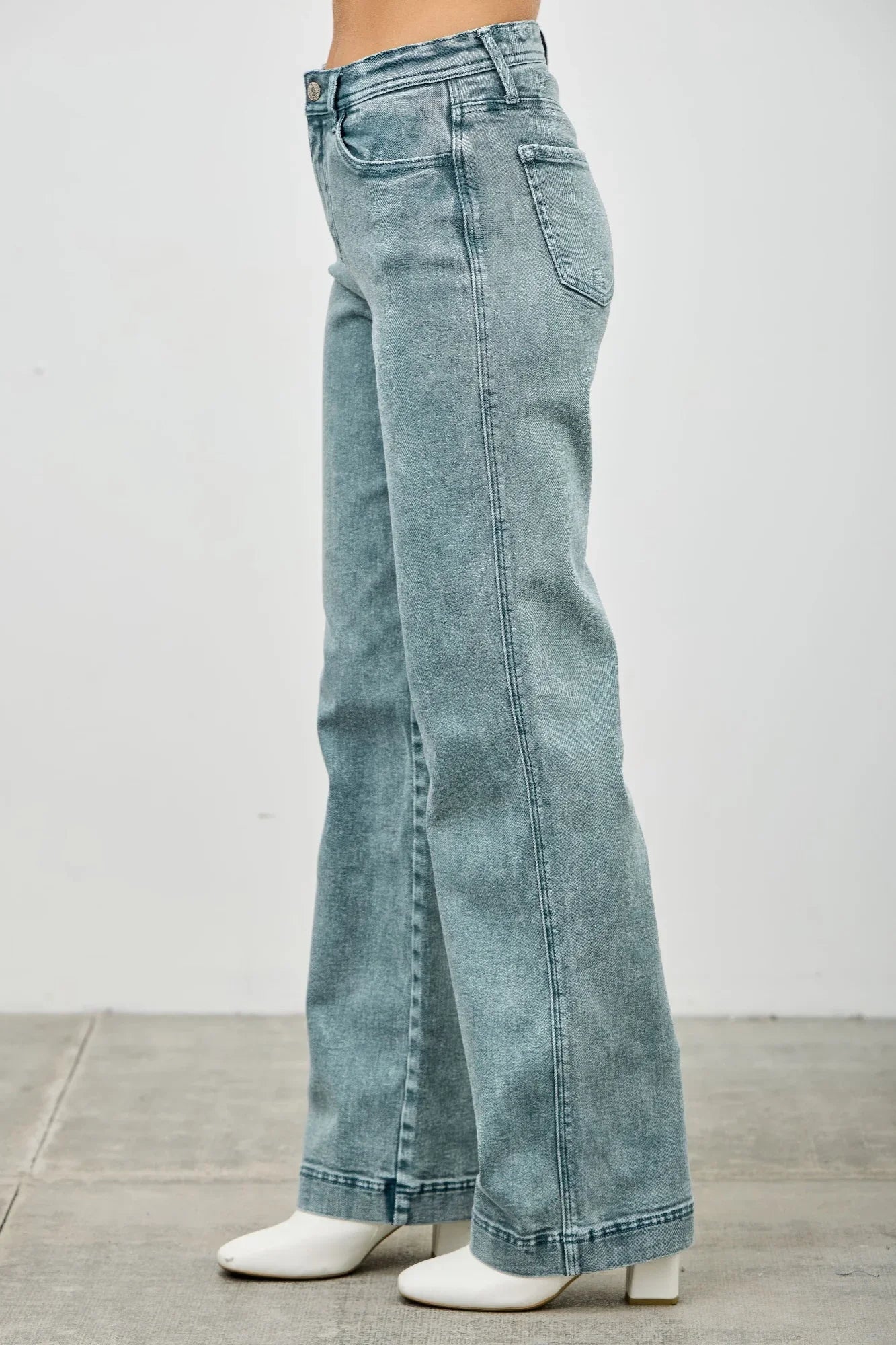 Light-wash high-rise Seige Denim flare jeans with rolled cuffs