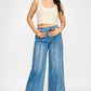 Saige Denim High Rise Wide Leg Tummy Control Jeans in blue with visible stitching