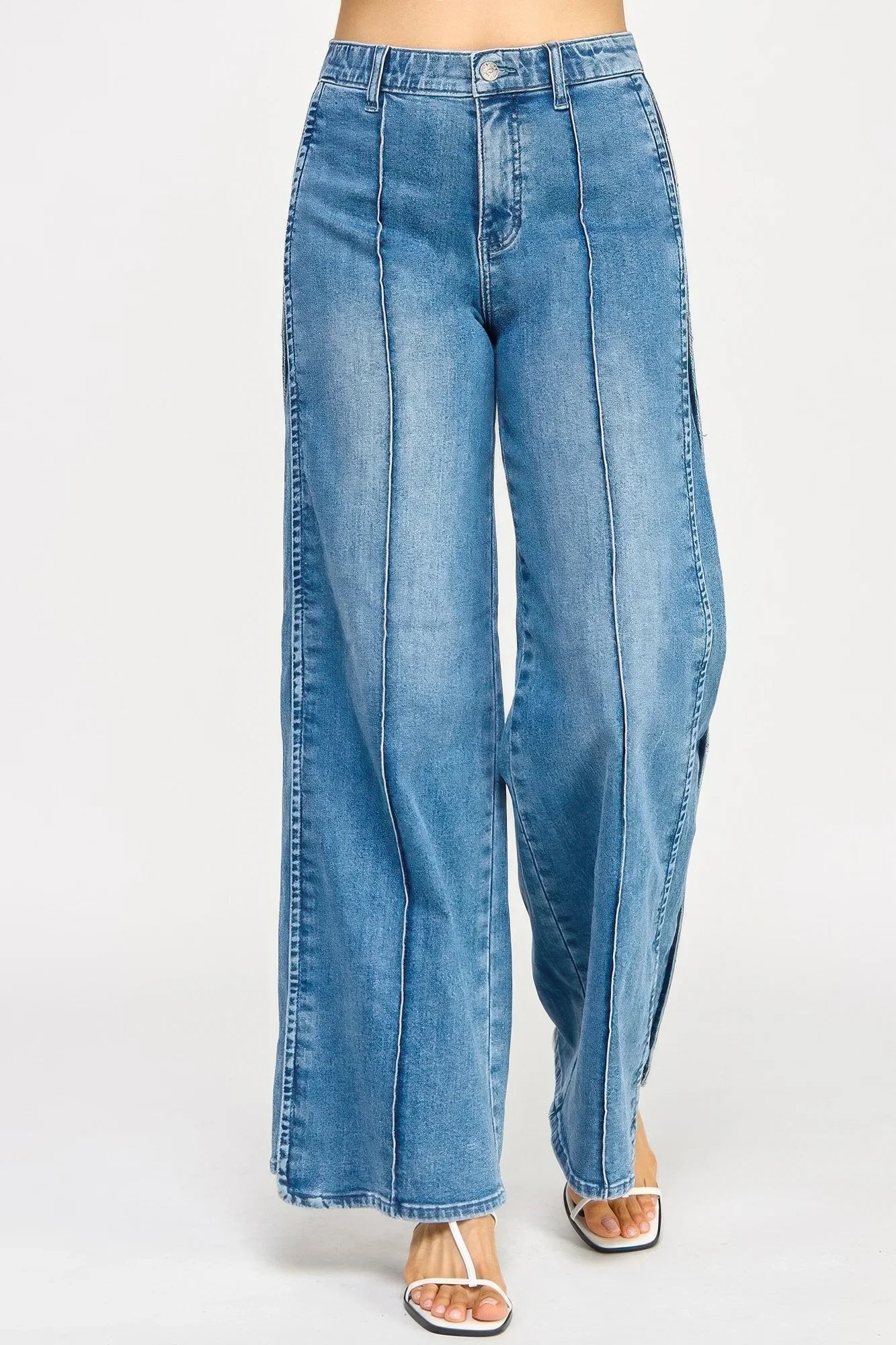 Saige Denim high-rise wide-leg jeans in light-wash blue with tummy control