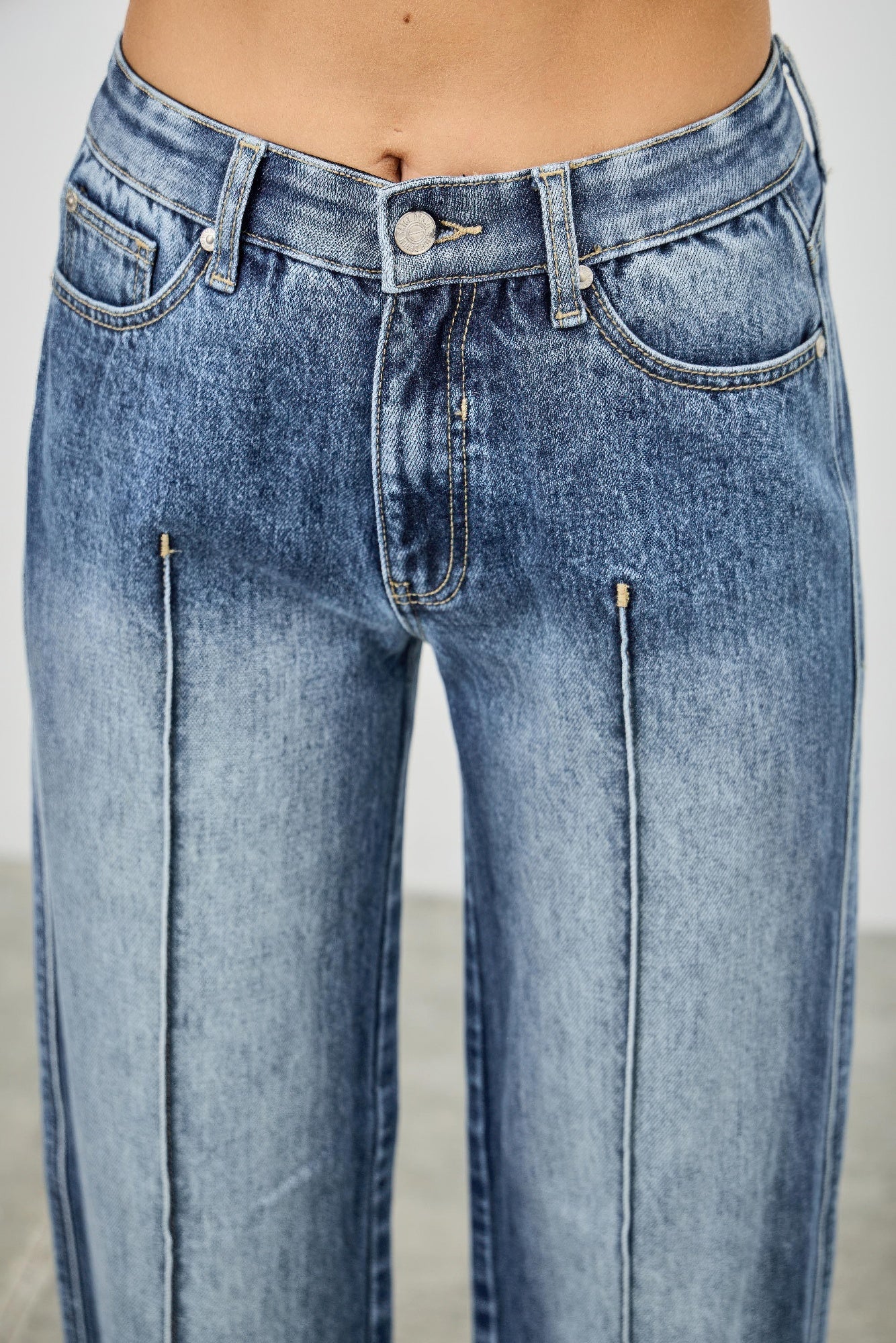 Mid-rise straight-leg blue denim jeans with pintuck and stitching details