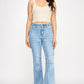High-rise light-wash denim flare jeans with thigh seam patchwork