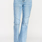 High-rise light-wash denim flare jeans with seam detail and knee patches