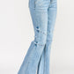 High-rise light-wash denim flare jeans with thigh seam detailing
