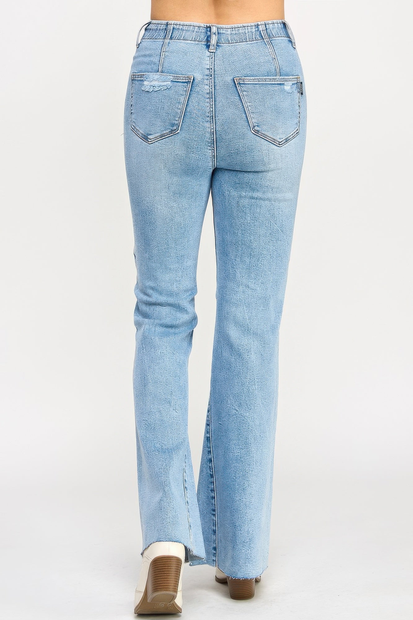 High-rise light-wash denim flare jeans with seam detail and frayed hems