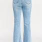 High-rise light-wash denim flare jeans with frayed hems and seam detail