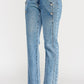 High rise dad jean with light-wash denim, silver side buttons, straight-leg cut