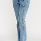 High-rise light-wash dad jeans with scallop pocket and silver side buttons