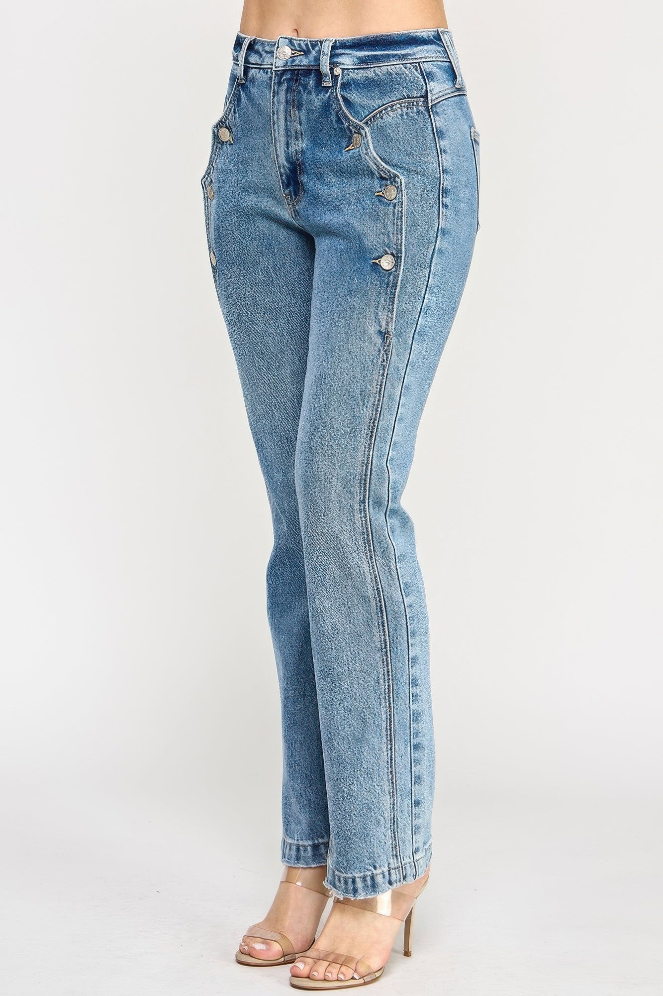 High-rise light-wash dad jeans with scallop pocket and silver side buttons