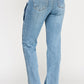 High rise dad jean with light-wash denim, straight-leg cut, and scallop pockets