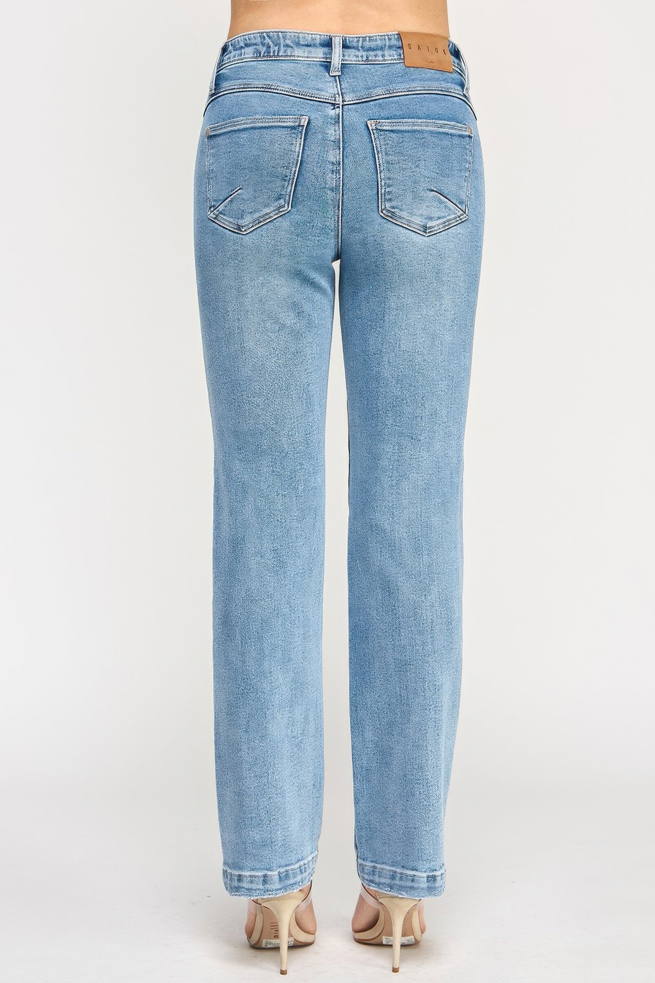 High rise dad jean with light-wash denim, straight-leg cut, and scallop pockets