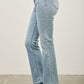 Light-wash mid-rise flare denim jeans with faded finish and frayed cuffs