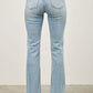 Mid rise light-wash denim flare jeans with frayed hems