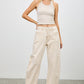 Beige high-rise wide-leg jeans with rolled cuffs and subtle stitching