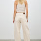 High rise beige wide-leg western barrel denim jeans with rolled cuffs