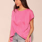 Washed poly silk tulip tunic top in soft pink with draped asymmetrical hem