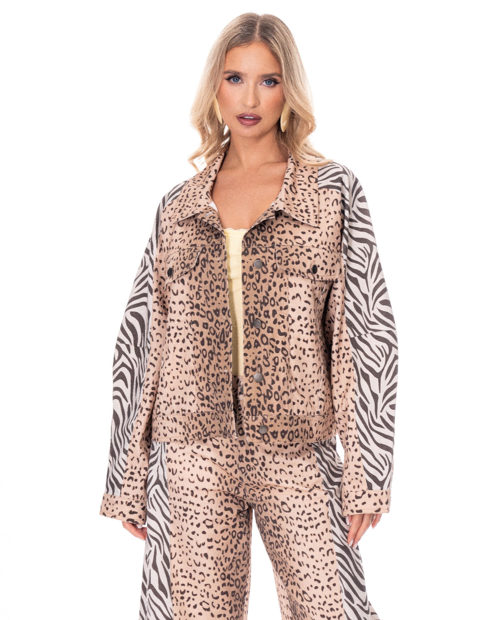 Beige and black leopard print denim jacket with zebra-striped sleeves