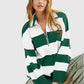 Green and white horizontally striped quarter-zip sweater with a relaxed fit.