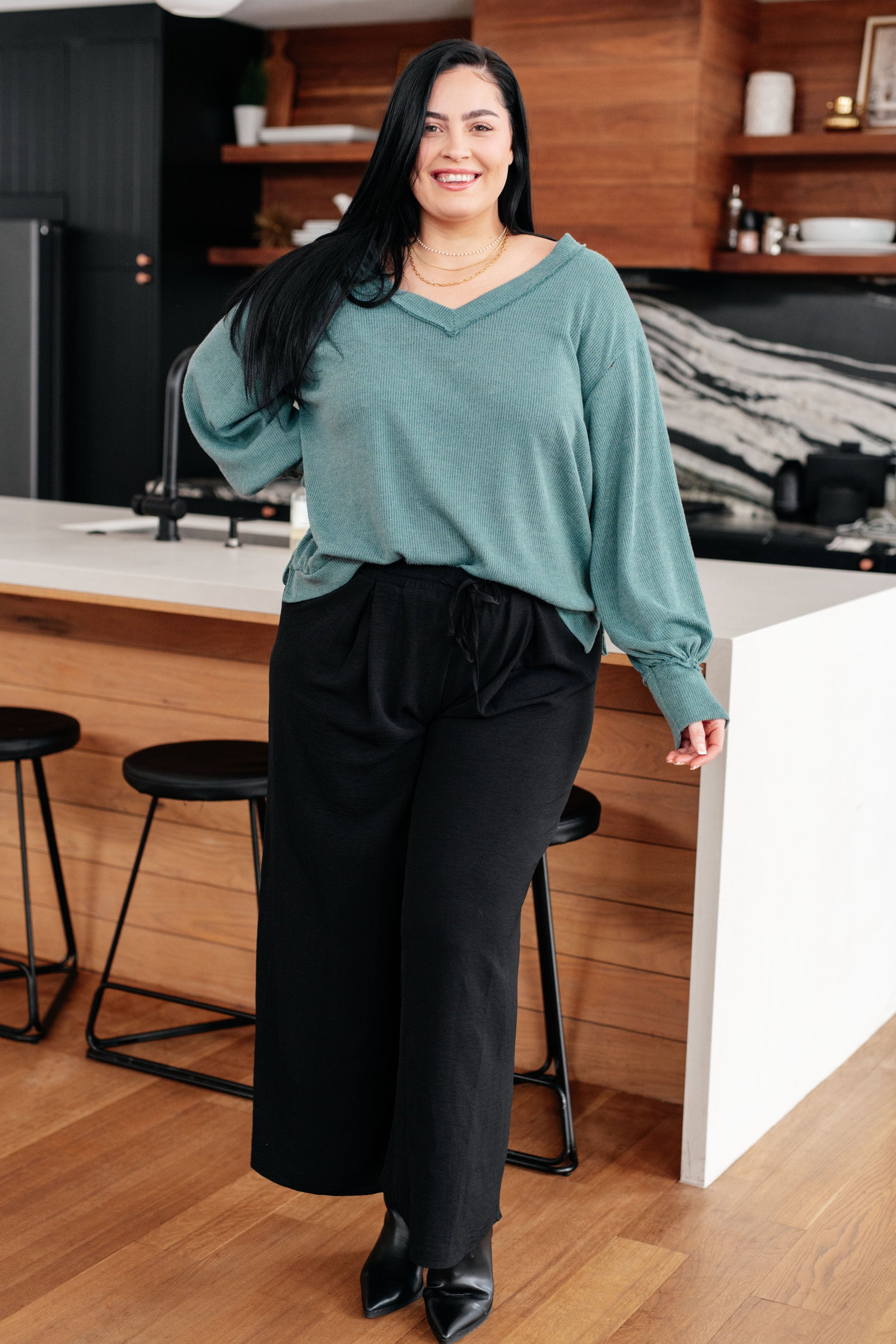 Teal ribbed long-sleeved v-neck sweater with puffed sleeves, Doesn’t Compare Top